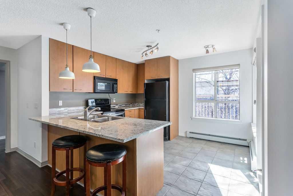 #218 5115 Richard Road SW, Calgary, Alberta, T3E 7M7