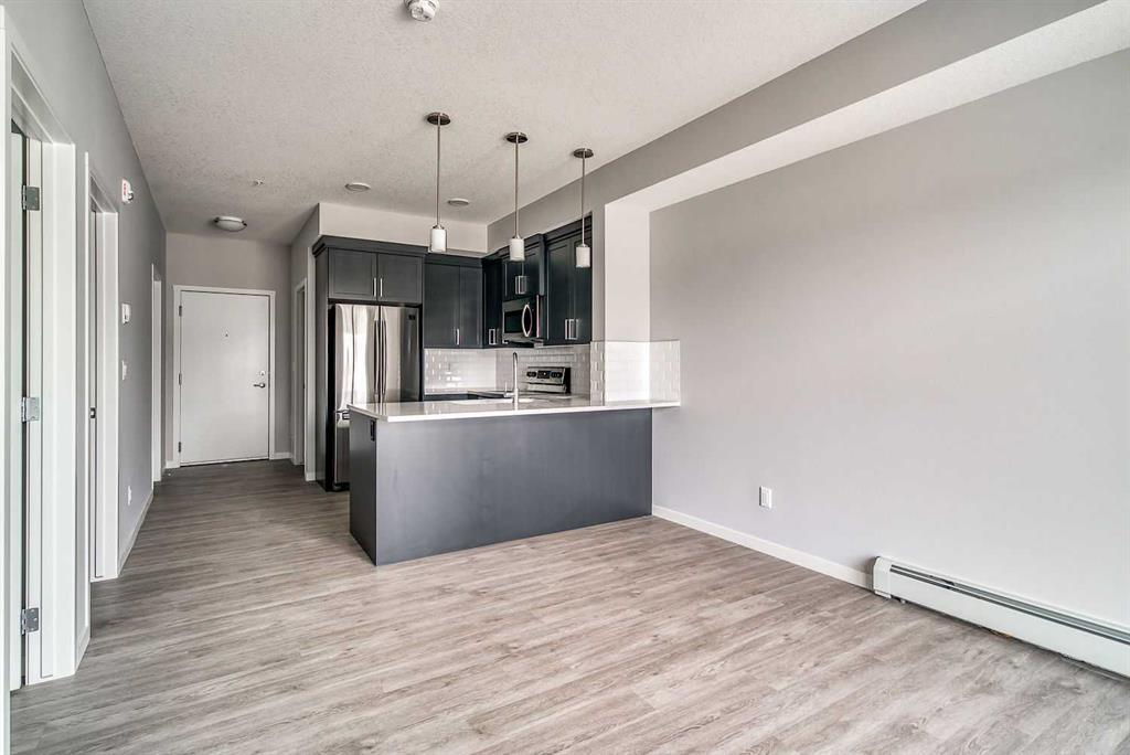 #215 300 Harvest Hills Place NE, Calgary, Alberta, T3K 2P4