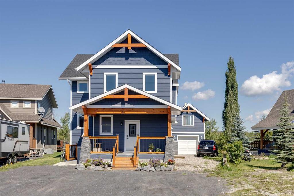216 Cottageclub Crescent, Rural Rocky View County, Alberta, T4C1B1