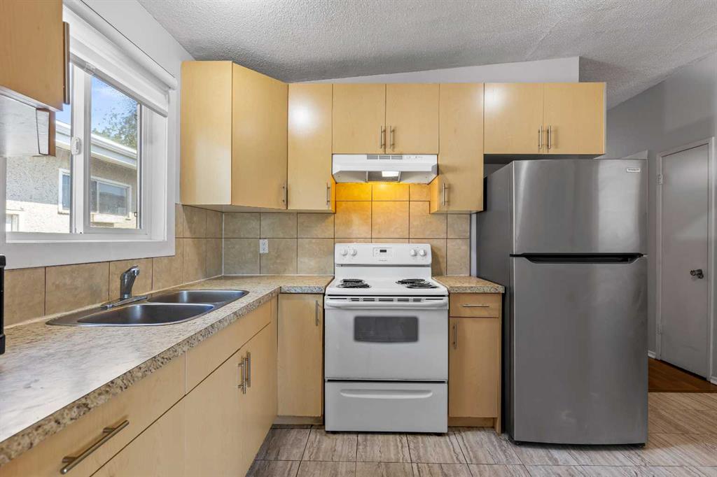 5908 Trelle Drive NE, Calgary, Alberta, T2K 3V4