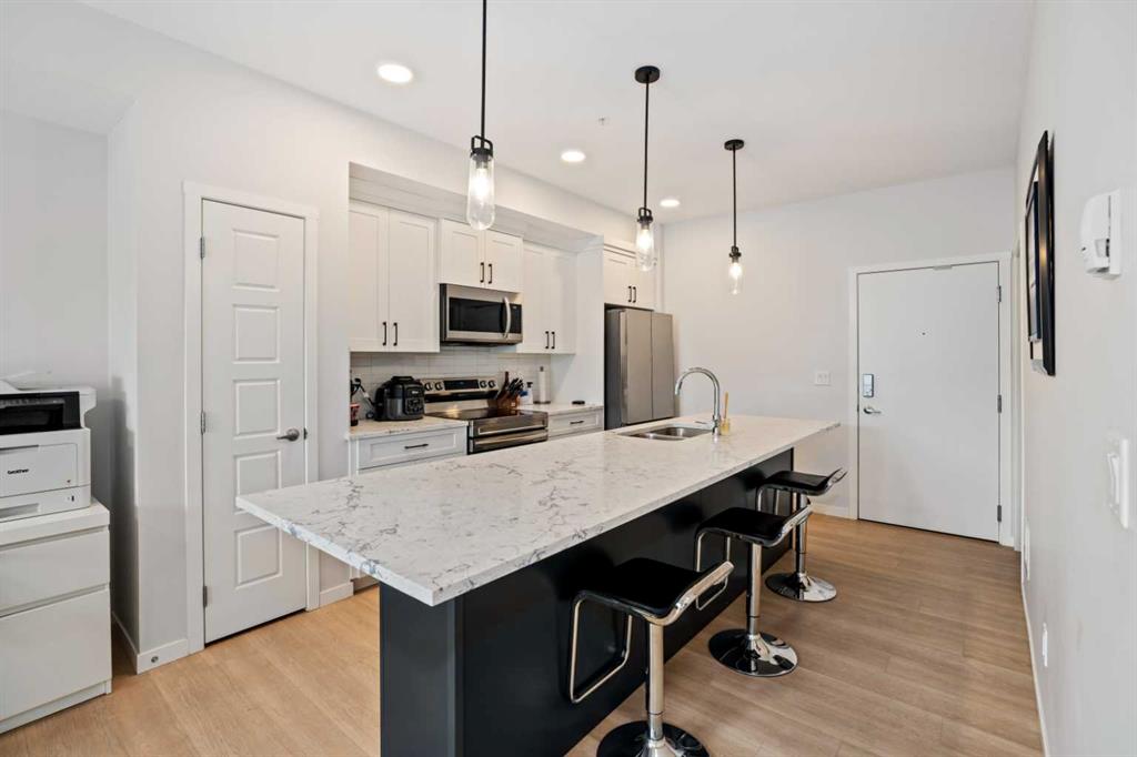 #411 200 Harvest Hills Place NE, Calgary, Alberta, T3K 2P4
