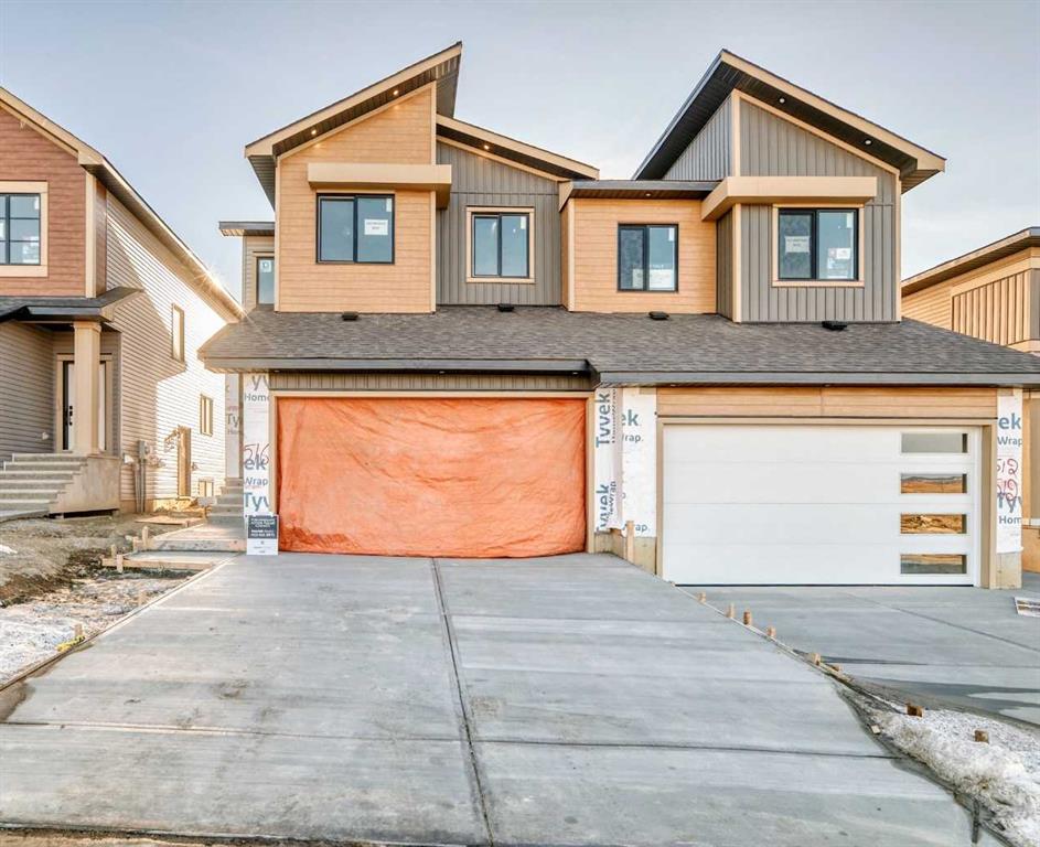 516 Heritage Boulevard, Cochrane, Alberta, T4C 2J8